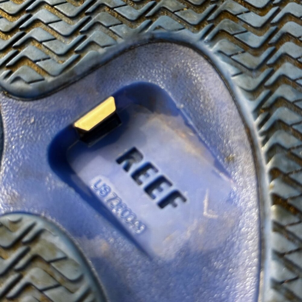 Reefs flip flops with bottle cap opener